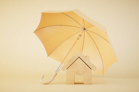 The concept of home insurance. An icon of the house and an umbrella above it on a pastel background. 3D rendering.の写真素材