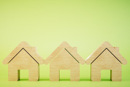 Icon of a wooden house on a green background. 3D rendering.の写真素材