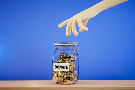 The concept of fundraising. A hand reaching for a jar of coins with the inscription Donate. 3D rendering.の写真素材