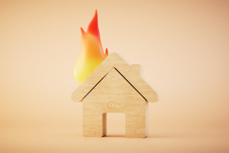 The concept of a house burning in case of fire. A house on fire on a pastel background. 3D...