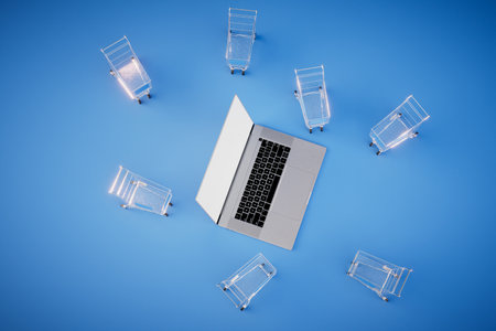 The concept of online shopping. An open laptop and many carts around it on a blue background. 3D rendering.の写真素材