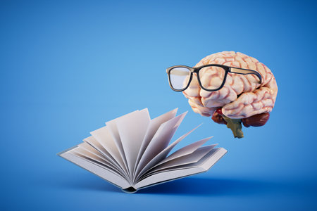 The concept of continuous learning. An open book and a brain with glasses on a blue background. 3D rendering.の写真素材