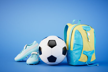 school football team. Football shoes, a ball and a backpack on a blue background. 3D rendering.の写真素材