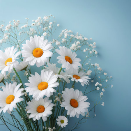 Beautiful daisies on a blue background with copy space. ai generative.の素材