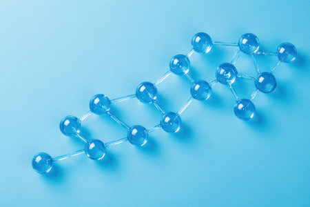 Scientific 3D molecular model with blue atoms and bonds on blue background, used in medicine, chemistry, and biotech visuals.の素材