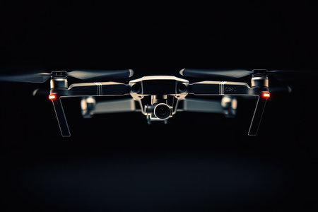 Futuristic drone close-up isolated on dark backdrop. Spy tech, surveillance, and modern aerial gadgetry concept.の素材