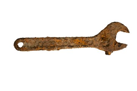 The adjustable spanner lay for a long time at the bottom of the pond and was very rusty.の写真素材