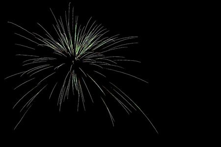 Colorful fireworks over the deep black night skyの写真素材