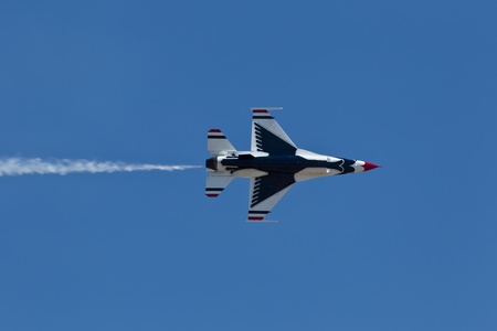 TRAVIS AIR FORCE BASE, CA - JULY 30: US Air Force Thunderbirds Demonstration Squadron, flying on Lockheed Martin F-16 Fighting Falcon showing precision of flying and the highest level of pilot skills during  Airshow  on July 30, 2011 at  Travis Air Force のeditorial素材