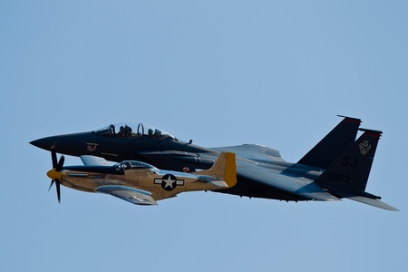 SACRAMENTO, CA - SEPT 10: P-51 Mustang World War II aircraft and Boeing F-15E Strike Eagle aircraft...