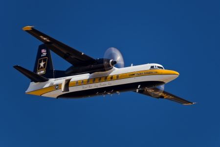 HILLSBORO, OR: AUG 5: The C-31A Troopship of the US Army Golden Knights Parachute Team flies above at the Oregon Air Show at Hillsboro Airport on August 5, 2012 in Hillsboro, OR. のeditorial素材