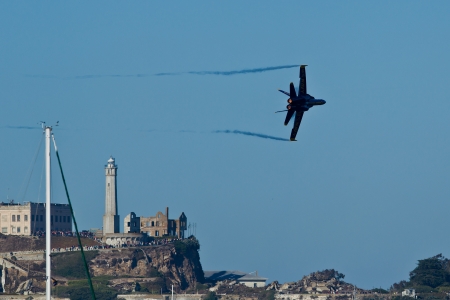 SAN FRANCISCO, CA - OCTOBER 7: US NAVY Demonstration Squadron Blue Angels, flying on Boeing F/A-18 Hornet showing precision of flying and the highest level of pilot skills during Fleet Week on October 7, 2012 in San Francisco, CA. のeditorial素材