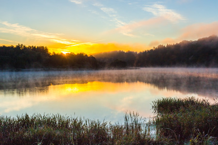 Morning foggy landscape image of Nemunas riverの写真素材