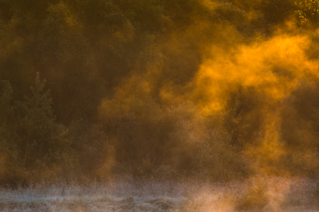 Image of morning mist over the surface of waterの写真素材