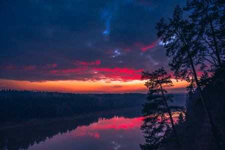 Aerial sunrise or sunset with colorful deep red sky