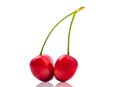 Cherries isolated on a white backgroundの写真素材