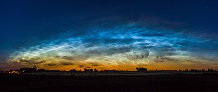 Night landscape with Noctilucent clouds at Lithuaniaの写真素材