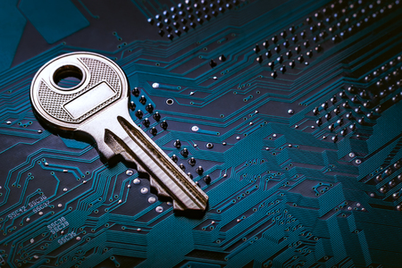 Background image of key on a microchipの写真素材