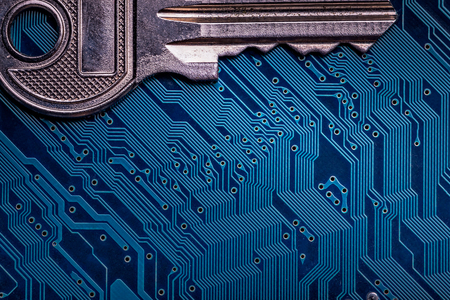 Background image of key on a microchipの写真素材