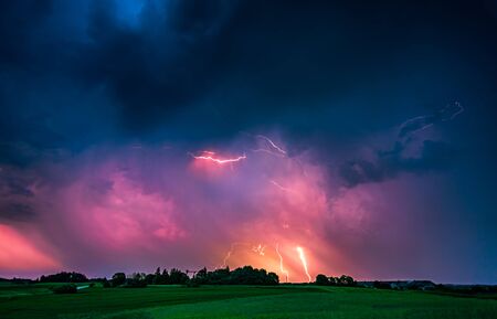 CLose up with lightning with dramatic clouds composite image . Night thunder-stormの写真素材