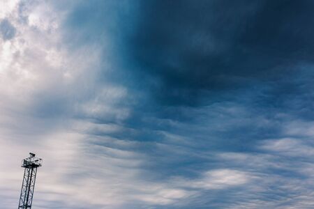Asperitas cloud formation with view tower, dramatic image