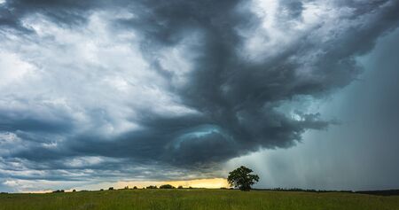 Supercell storm clouds with intense tropic rain