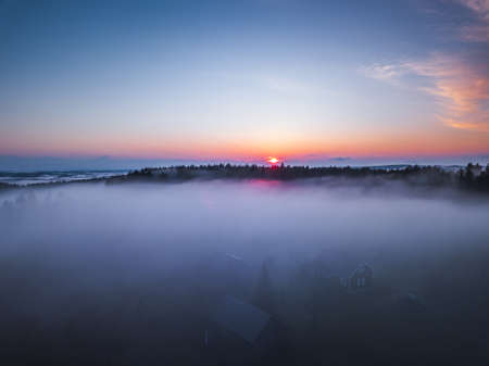 Fog and mist covering the fields in Lithuaniaの写真素材