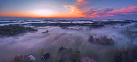 Fog and mist covering the fields in Lithuaniaの写真素材