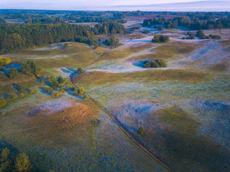 Landscape with frost shadows in the early autumn morningの写真素材