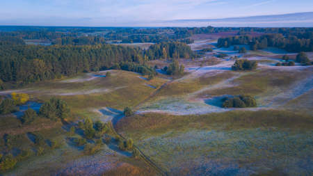 Landscape with frost shadows in the early autumn morningの写真素材