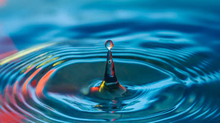 Blue Water drop splash with red tones