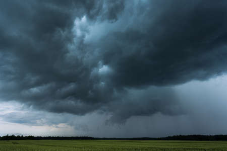 Supercell storm clouds with intense tropic rain