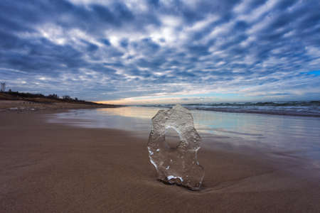 Baltic sea landscape with ice crystal in the sandの写真素材