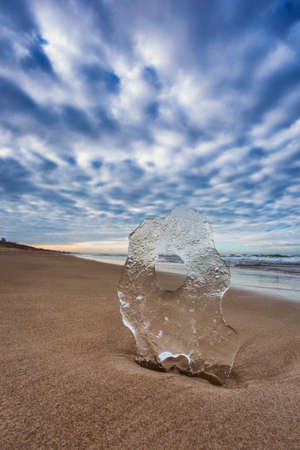 Baltic sea landscape with ice crystal in the sandの写真素材