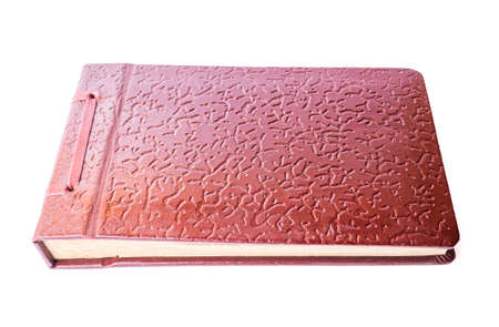 Vintage brown leather textured photo album isolated on white backgroundの写真素材