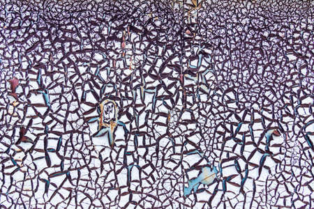 Abstract background of textured blue cracked wall.の写真素材