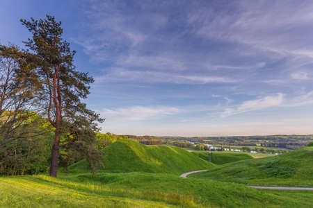 Lithuanian historic capital Kernave, green landscape of Kernave moundsの写真素材
