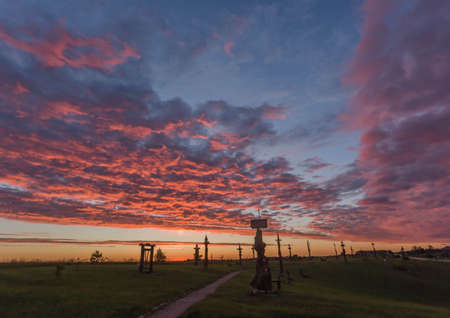The hill of angels with wooden angels and crosses the popular touristic place near Vilnius, Lithuania, Europeの写真素材