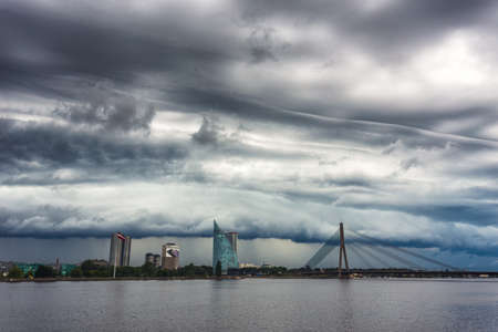 Shelf cloud moving over Riga city, capital of Latvia, timelapse movieのeditorial素材