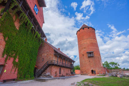 Old Turaida castle with tower in a sunny day. Summer landscape. Gauja national park, Sigulda, Latviaの写真素材