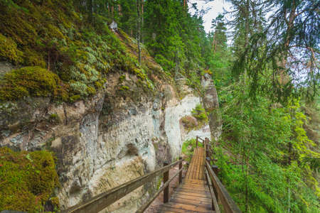 Sandstone cliffs of Sietiniezis on the shore of the river Gauja in Latviaの写真素材
