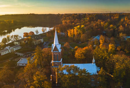 Autumn aerial view of Birstonas city church. It is popular tourist destination in Lithuania, located on the shore of Neman river. City is popular of its sanatoriums, mineral water springs and parks.の写真素材