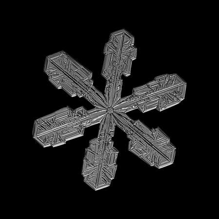 White snowflake isolated on black background. Illustration based on macro photo of real snow crystal: elegant star plate with short, broad arms, glossy relief surface and complex inner details.の写真素材