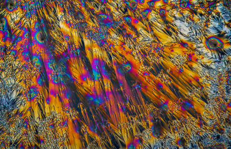 Extreme macro photograph of Vitamin C crystals forming abstract modern art patterns, when...