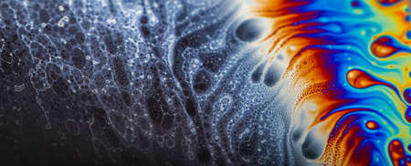 Abstract multicolor psychedelic background Closeup Soap bubble backgroundの写真素材