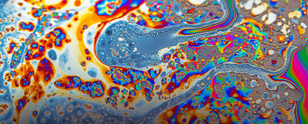 Abstract multicolor psychedelic background Closeup Soap bubble backgroundの写真素材