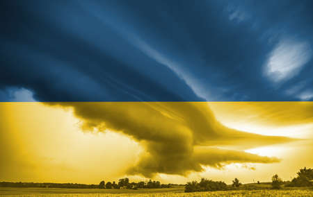 Ukrainian national flag pattern with storm, war conceptの写真素材