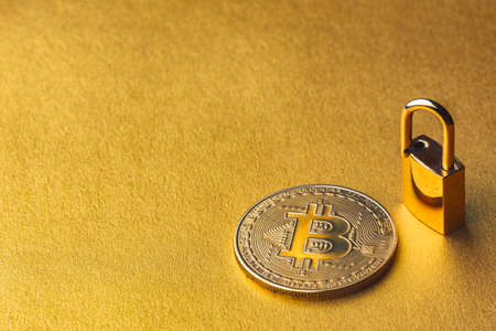 Unlock bitcoin, background with bitcoin and lockの写真素材