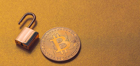 Unlock bitcoin, background with bitcoin and lockの写真素材
