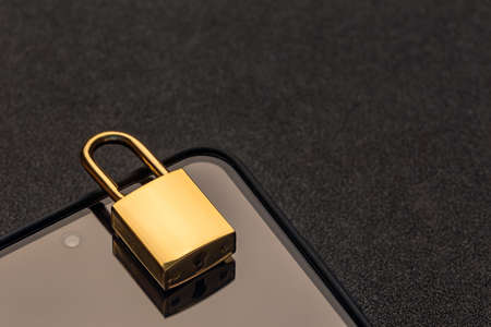 Banned from using smartphone, locked phone conceptの写真素材